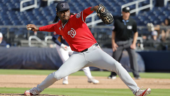 Feb 22, 2025; West Palm Beach, Florida, USA; Washington Nationals right hand pitcher Marquis Grissom Jr. throws a pitch in the ninth inning against the Houston Astros at CACTI Park of the Palm Beaches. 