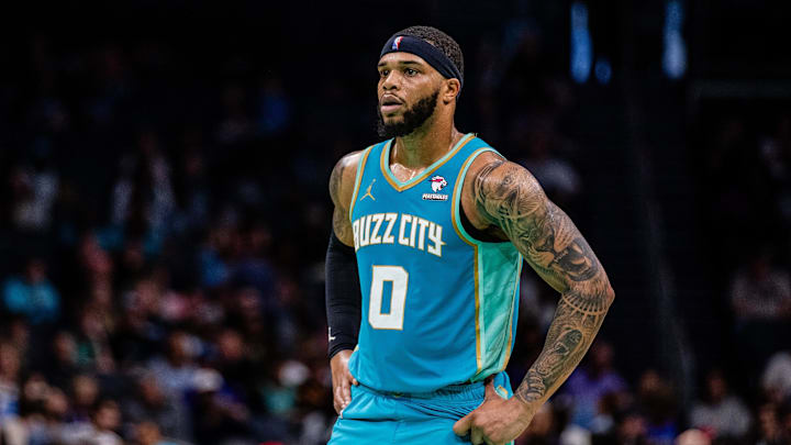 Apr 7, 2024; Charlotte, North Carolina, USA; Charlotte Hornets forward Miles Bridges (0) looks on during the third quarter against the Oklahoma City Thunder at Spectrum Center. Mandatory Credit: Scott Kinser-USA TODAY Sports