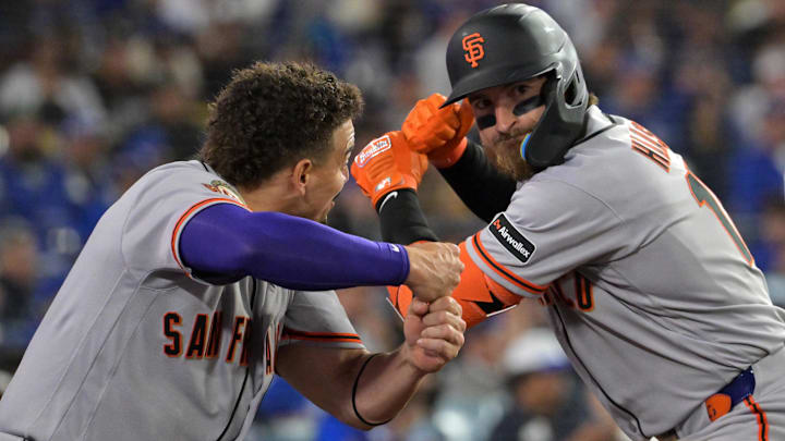 May 12, 2026: San Francisco Giants catcher Eric Haase (18) celebrates with shortstop Willy Adames (2) after hitting his second one run home run of the game against the Los Angeles Dodgers during the fifth inning at Dodger Stadium. 