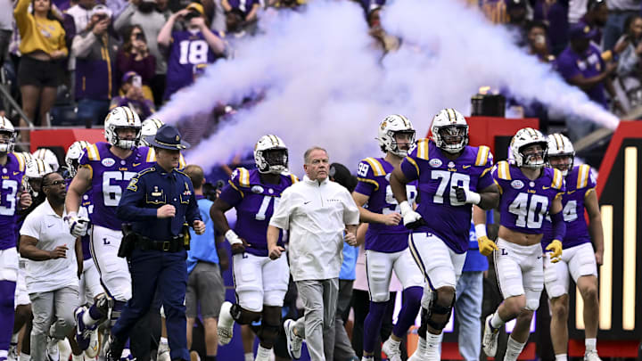 Dec 31, 2024; Houston, TX, USA; LSU Tigers head coach Brian Kelly enters the field with the team prior to the game against the Baylor Bears at NRG Stadium. Mandatory Credit: Maria Lysaker-Imagn Images 