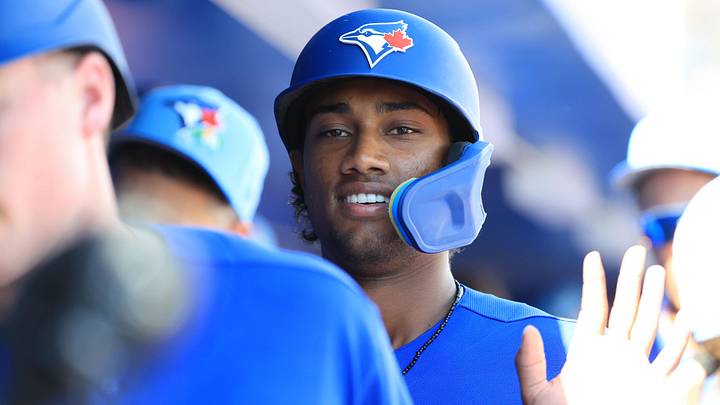 Mar 3, 2026; Dunedin, FL, USA; Toronto Blue Jays shortstop Arjun Nimmala (18) scores a run during the second inning against Team Canada at TD Ballpark. Mandatory Credit: Kim Klement Neitzel-Imagn Images