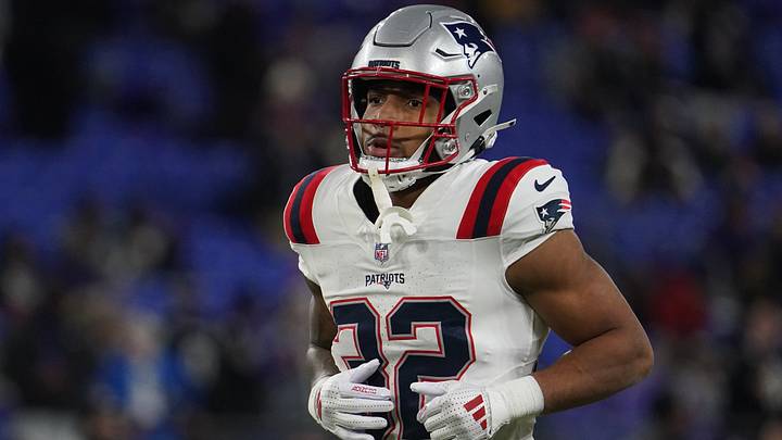 Dec 21, 2025; Baltimore, Maryland, USA;  New England Patriots running back Treveyon Henderson (32) warms up prior to the game against the Baltimore Ravens at M&T Bank Stadium. 