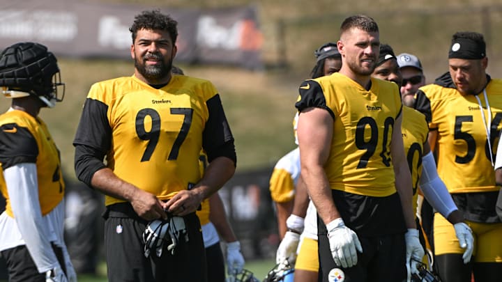 Jul 28, 2024; Latrobe, PA, USA; Pittsburgh Steelers defensive tackle Cameron Heyward (97) and linebacker T.J. Watt (90) participate in drills during training camp at Saint Vincent College. Mandatory Credit: Barry Reeger-Imagn Images