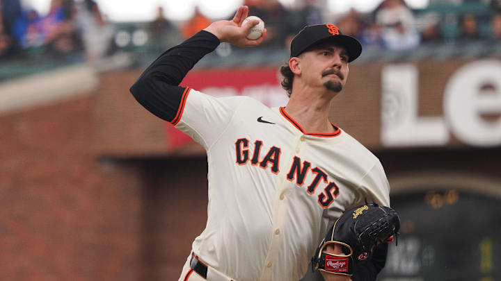 Apr 24, 2024; San Francisco, California, USA; San Francisco Giants relief pitcher Sean Hjelle (64) pitches the ball against the New York Mets during the third inning at Oracle Park.