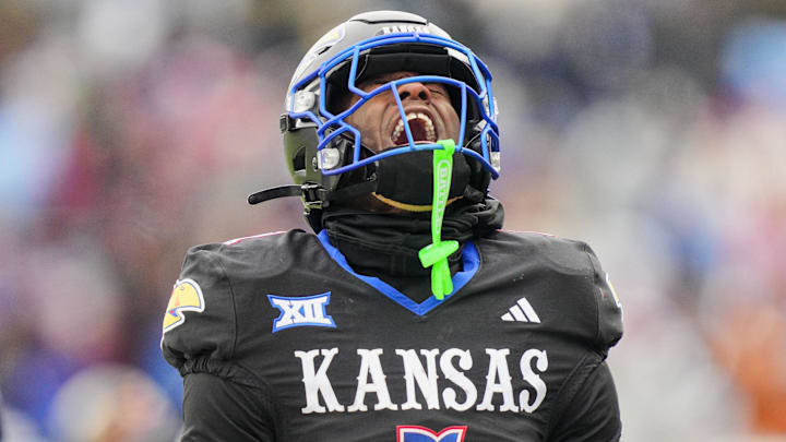 Nov 28, 2025; Lawrence, Kansas, USA; Kansas Jayhawks wide receiver Emmanuel Henderson Jr. (1) reacts during the second half against the Utah Utes at David Booth Kansas Memorial Stadium. Mandatory Credit: Jay Biggerstaff-Imagn Images