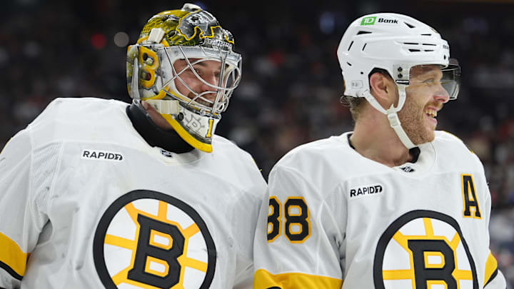 Feb 28, 2026; Philadelphia, Pennsylvania, USA; Boston Bruins goalie Jeremy Swayman (1) reacts with right wing David Pastrnak (88) against the Philadelphia Flyers in the second period at Xfinity Mobile Arena. Mandatory Credit: Kyle Ross-Imagn Images