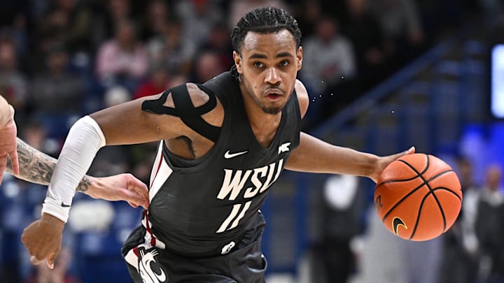 Feb 10, 2026; Spokane, Washington, USA; Washington State Cougars guard Jerone Morton (11) controls the ball against the Gonzaga Bulldogs in the second half  at McCarthey Athletic Center. Mandatory Credit: James Snook-Imagn Images
