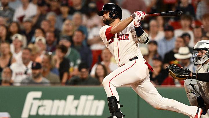 Jun 16, 2026; Boston, Massachusetts, USA; Boston Red Sox second baseman Isiah Kiner-Falefa (2) hits a single against the Toronto Blue Jays during the eighth inning at Fenway Park. Mandatory Credit: Brian Fluharty-Imagn Images