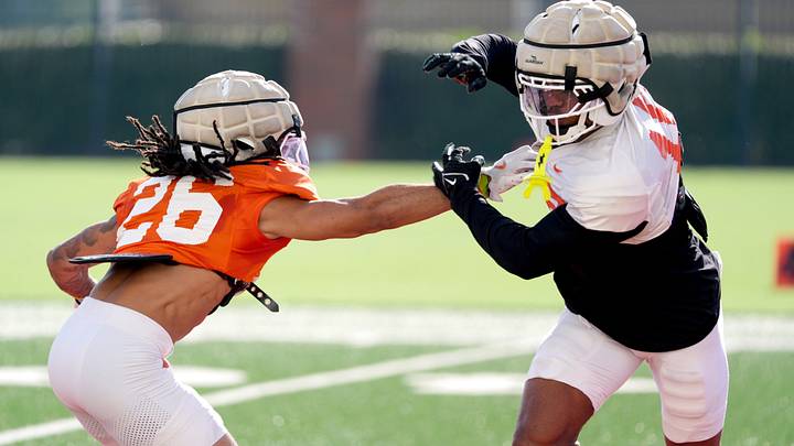 Oklahoma State's Mose Phillips III (right) works out during a practice. Oklahoma State's Mose Phillips III (right) works out during a practice.