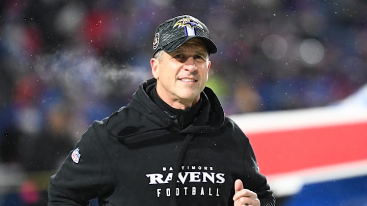 Jan 19, 2025; Orchard Park, New York, USA; Baltimore Ravens head coach John Harbaugh takes the field before the game against the Buffalo Bills in a 2025 AFC divisional round game at Highmark Stadium. Mandatory Credit: Mark Konezny-Imagn Images