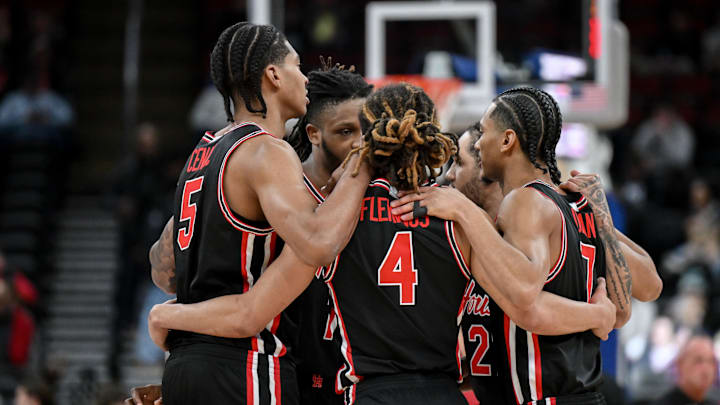 Dec 20, 2025; Newark, New Jersey, USA; Houston Cougars huddle before the start of the game against the Arkansas Razorbacks at Prudential Center. Mandatory Credit: John Jones-Imagn Images