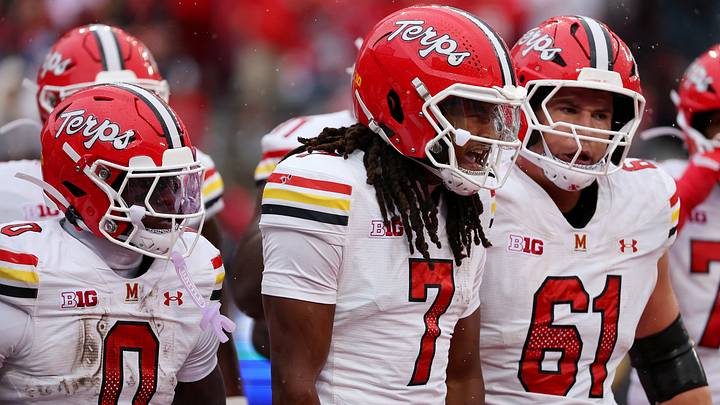 Oct 10, 2026; Columbus, Ohio, USA; Maryland Terrapins quarterback Malik Washington (7) celebrates his touchdown run with center Michael Hershey (61) during the second quarter at Ohio Stadium. Photo by Joseph Maiorana Oct 10, 2026; Columbus, Ohio, USA; Maryland Terrapins quarterback Malik Washington (7) celebrates his touchdown run with center Michael Hershey (61) during the second quarter at Ohio Stadium. Photo by Joseph Maiorana