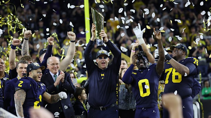 Jim Harbaugh and The Michigan Wolverines celebrate after defeating the Washington Huskies 34-13 to win the CFP National Championship game at NRG Stadium on January 8, 2024 in Houston, Texas.