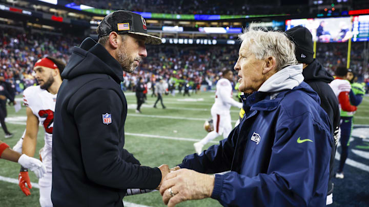 San Francisco 49ers head coach Kyle Shanahan, left, shakes hands with Seattle Seahawks head coach Pete Carroll, right San Francisco 49ers head coach Kyle Shanahan, left, shakes hands with Seattle Seahawks head coach Pete Carroll, right
