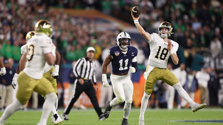 Jan 9, 2025; Miami, FL, USA; Notre Dame Fighting Irish quarterback Steve Angeli (18) throws the ball in the first half against the Penn State Nittany Lions in the Orange Bowl at Hard Rock Stadium. Mandatory Credit: Nathan Ray Seebeck-Imagn Images Jan 9, 2025; Miami, FL, USA; Notre Dame Fighting Irish quarterback Steve Angeli (18) throws the ball in the first half against the Penn State Nittany Lions in the Orange Bowl at Hard Rock Stadium. Mandatory Credit: Nathan Ray Seebeck-Imagn Images
