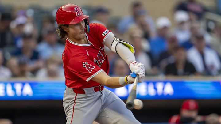 Sep 9, 2024; Minneapolis, Minnesota, USA; Los Angeles Angels center fielder Bryce Teodosio (22) hits a ground ball against the Minnesota Twins in the second inning at Target Field. Mandatory Credit: Jesse Johnson-Imagn Images