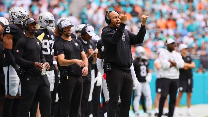 Nov 17, 2024; Miami Gardens, Florida, USA; Las Vegas Raiders head coach Antonio Pierce reacts from the sideline against the Miami Dolphins during the first quarter at Hard Rock Stadium. Mandatory Credit: Sam Navarro-Imagn Images