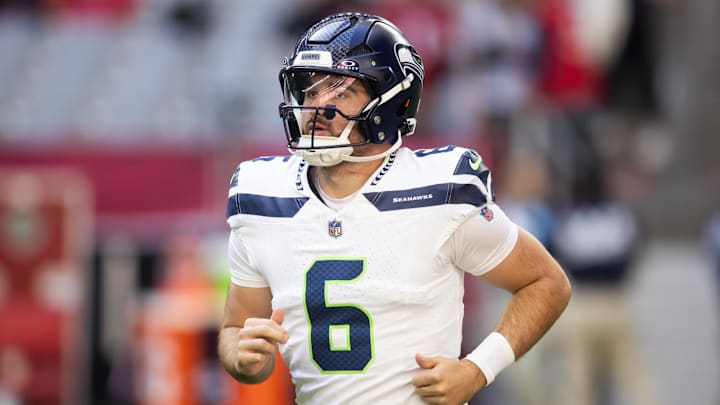 Dec 8, 2024; Glendale, Arizona, USA; Seattle Seahawks quarterback Sam Howell (6) against the Arizona Cardinals at State Farm Stadium. Mandatory Credit: Mark J. Rebilas-Imagn Images