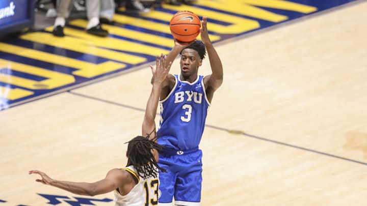 Feb 28, 2026; Morgantown, West Virginia, USA; BYU Cougars forward AJ Dybantsa (3) shoots a three pointer over West Virginia Mountaineers guard Chance Moore (13) during the second half at Hope Coliseum. Mandatory Credit: Ben Queen-Imagn Images Feb 28, 2026; Morgantown, West Virginia, USA; BYU Cougars forward AJ Dybantsa (3) shoots a three pointer over West Virginia Mountaineers guard Chance Moore (13) during the second half at Hope Coliseum. Mandatory Credit: Ben Queen-Imagn Images