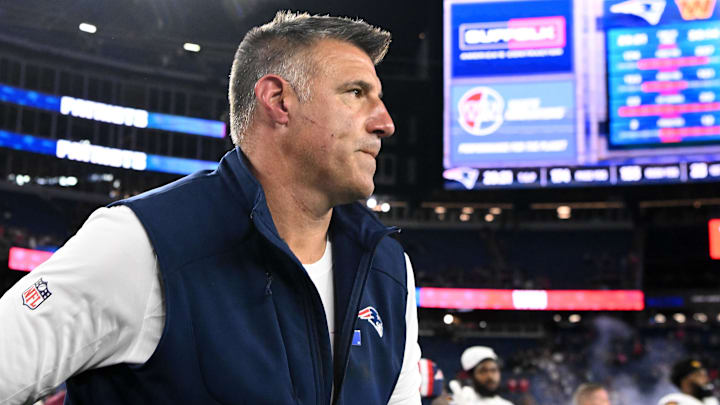 New England Patriots head coach Mike Vrabel walks off of the field after a game against the Washington Commanders at Gillette Stadium.