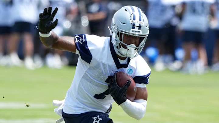 Dallas Cowboys receiver Traeshon Holden carries the ball during training camp at the River Ridge Fields. Dallas Cowboys receiver Traeshon Holden carries the ball during training camp at the River Ridge Fields.