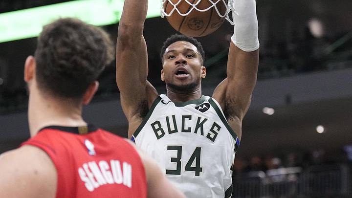 Nov 9, 2025; Milwaukee, Wisconsin, USA; Milwaukee Bucks forward Giannis Antetokounmpo (34) dunks the ball againtst Houston Rockets center Alperen Sengun (28) in the second half at Fiserv Forum. Mandatory Credit: Michael McLoone-Imagn Images