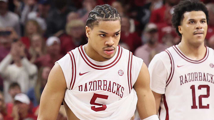 Arkansas Razorbacks guard Darius Acuff Jr (5) celebrates after a play against the Tennessee Volunteers during the second half as forward Malique Ewin (12) looks on at Bud Walton Arena in Fayetteville, Ark.