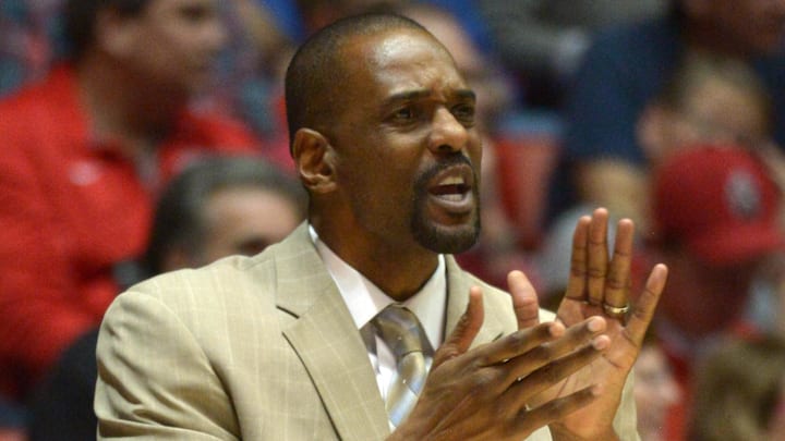 Former UNLV Runnin' Rebels assistant coach Stacey Augmon reacts against the New Mexico Lobos at The Pit Arena. UNLV defeated New Mexico 76-68. Former UNLV Runnin' Rebels assistant coach Stacey Augmon reacts against the New Mexico Lobos at The Pit Arena. UNLV defeated New Mexico 76-68.