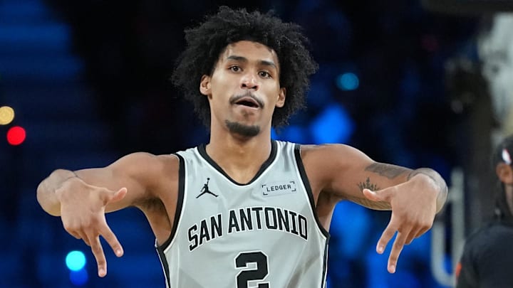 Dec 16, 2025; Las Vegas, Nevada, USA; San Antonio Spurs guard Dylan Harper (2) reacts against the New York Knicks in the second half during the Emirates NBA Cup Final at T-Mobile Arena. Mandatory Credit: Kirby Lee-Imagn Images Dec 16, 2025; Las Vegas, Nevada, USA; San Antonio Spurs guard Dylan Harper (2) reacts against the New York Knicks in the second half during the Emirates NBA Cup Final at T-Mobile Arena. Mandatory Credit: Kirby Lee-Imagn Images
