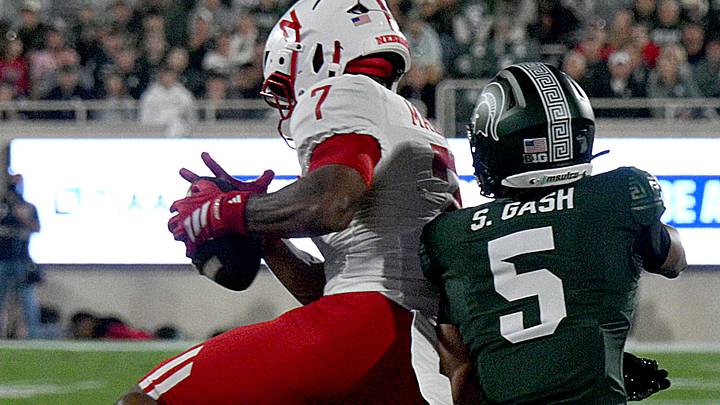 Nebraska defensive back Andrew Marshall intercepts a pass intended for Michigan State wide receiver Samson Gash during the fourth quarter at Spartan Stadium.