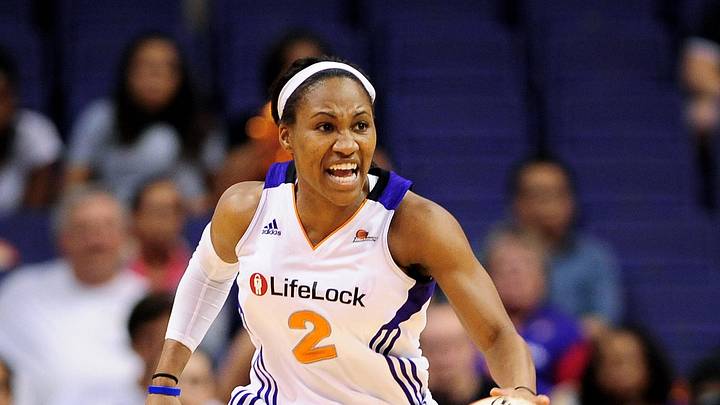 Sep 25, 2011; Phoenix, AZ, USA; Phoenix Mercury guard Temeka Johnson (2) handles the ball against the Minnesota Lynx during the second half at the US Airways Center.  The Lynx defeated the Mercury 103-86. Mandatory Credit: Jennifer Stewart-Imagn Images