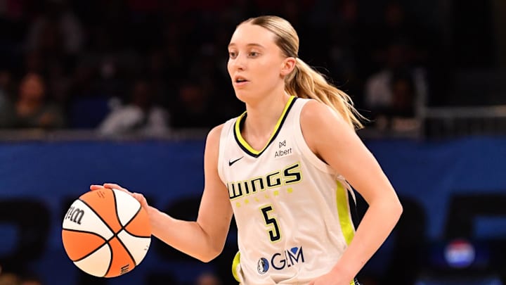 May 29, 2025; Chicago, Illinois, USA; Dallas Wings guard Paige Bueckers (5) controls the ball during the second half against the Chicago Sky at the Wintrust Arena. Mandatory Credit: Patrick Gorski-Imagn Images