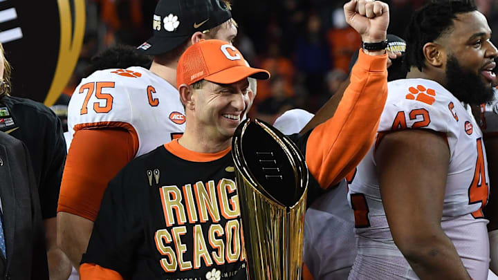 Clemson head coach Dabo Swinney celebrates in front of the College Football National Championship trophy after the Tigers defeated Alabama 44-16 at Levi's Stadium in Santa Clara, Calif. Monday, Jan. 7. 
 BART BOATWRIGHT/greenville news
Clemson head coach Dabo Swinney celebrates in front of the College Football National Championship trophy after the Tigers defeated Alabama 44-16 at Levi's Stadium in Santa Clara, CA Monday, January 7, 2019.

Clemson Alabama College Football National Championship