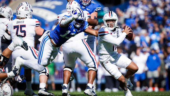 BYU defensive end Isaiah Bagnah pressures Noah Fifita