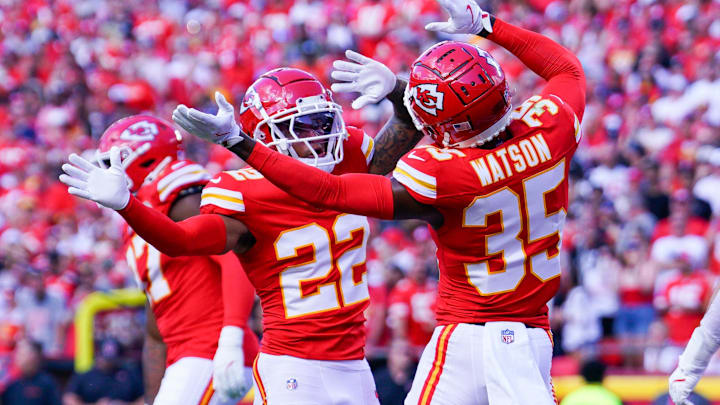 Sep 15, 2024; Kansas City, Missouri, USA; Kansas City Chiefs cornerback Trent McDuffie (22) celebrates with cornerback Jaylen Watson (35) after a play against the Cincinnati Bengals during the first half at GEHA Field at Arrowhead Stadium. Mandatory Credit: Denny Medley-Imagn Images
