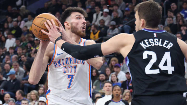 Feb 21, 2025; Salt Lake City, Utah, USA; Oklahoma City Thunder forward Chet Holmgren (7) goes to the basket against Utah Jazz center Walker Kessler (24) during the second quarter at Delta Center. Mandatory Credit: Rob Gray-Imagn Images