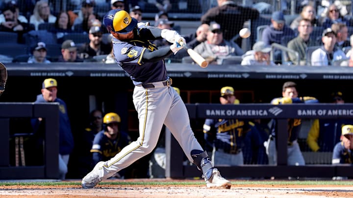 Mar 27, 2025: Milwaukee Brewers third baseman Vinny Capra (18) hits a solo home run against the New York Yankees during the third inning at Yankee Stadium. 