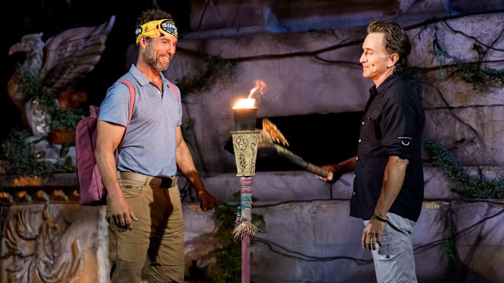 “The Blood Moon” – A mysterious boat arrives delivering an exciting message, “Drop your buffs!” A mad dash ensues when castaways discover that an advantage is hidden deep in the jungle. This week’s mouthwatering challenge reward lifts spirits, but only briefly. A true Survivor first, the dreaded blood moon leads to historic tribal council, on SURVIVOR 50. Photo: Robert Voets/CBS ©2025 CBS Broadcasting, Inc. All Rights Reserved. “The Blood Moon” – A mysterious boat arrives delivering an exciting message, “Drop your buffs!” A mad dash ensues when castaways discover that an advantage is hidden deep in the jungle. This week’s mouthwatering challenge reward lifts spirits, but only briefly. A true Survivor first, the dreaded blood moon leads to historic tribal council, on SURVIVOR 50. Photo: Robert Voets/CBS ©2025 CBS Broadcasting, Inc. All Rights Reserved.