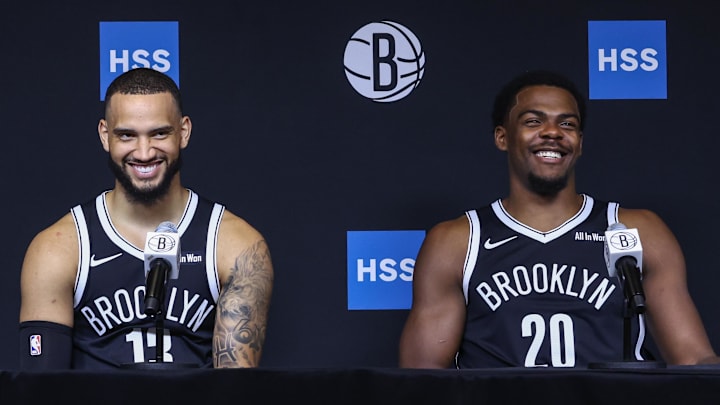 Sep 23, 2025; Brooklyn, NY, USA;  Brooklyn Nets guard Tyrese Martin (13) and center Day'Ron Sharpe (20) speak at Media Day. Mandatory Credit: Wendell Cruz-Imagn Images