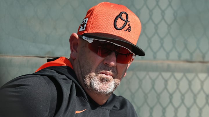 Feb 13, 2025; Sarasota, FL, USA;  Baltimore Orioles manager Brandon Hyde (18) looks on during spring training workouts at Ed Smith Stadium. 