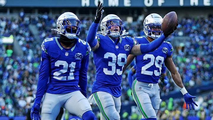 Seattle Seahawks safety Ty Okada celebrates after retrieving a fumble during the second half against the Minnesota Vikings.