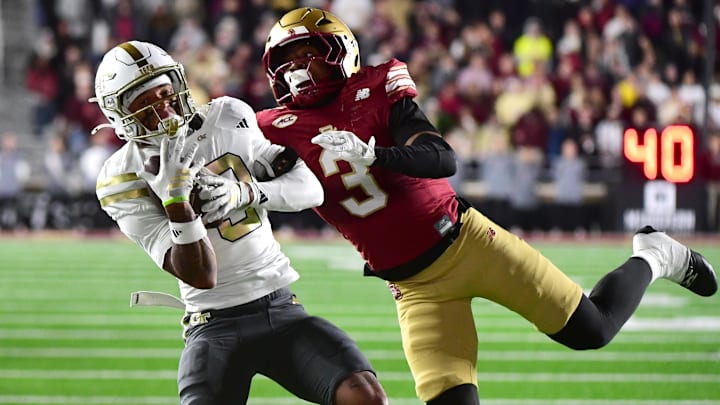 Nov 15, 2025; Chestnut Hill, Massachusetts, USA; Georgia Tech Yellow Jackets wide receiver Eric Rivers (3) makes a catch while being defended by Boston College Eagles defensive back Max Tucker (3) during the second half at Alumni Stadium. Mandatory Credit: Bob DeChiara-Imagn Images