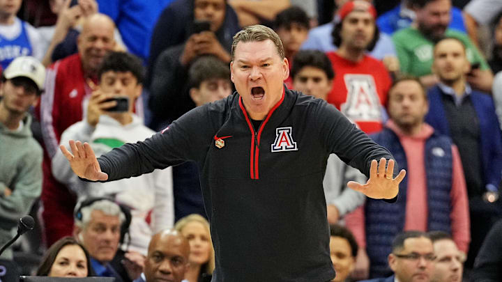 Mar 27, 2025; Newark, NJ, USA; Arizona Wildcats head coach Tommy Lloyd during the second half against the Duke Blue Devils during an East Regional semifinal of the 2025 NCAA tournament at Prudential Center. Mandatory Credit: Robert Deutsch-Imagn Images Mar 27, 2025; Newark, NJ, USA; Arizona Wildcats head coach Tommy Lloyd during the second half against the Duke Blue Devils during an East Regional semifinal of the 2025 NCAA tournament at Prudential Center. Mandatory Credit: Robert Deutsch-Imagn Images