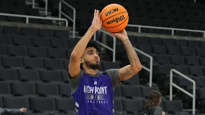 Mar 19, 2025; Providence, RI, USA; High Point Panthers guard Kezza Giffa (1) shoots a the ball during the first round practice session at Amica Mutual Pavilion. Mandatory Credit: Gregory Fisher-Imagn Images