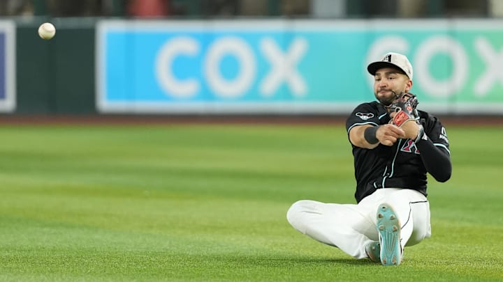 Phoenix, Arizona, USA; Arizona Diamondbacks second baseman Jordan Lawlar (10) makes a throw to first against the Colorado Rockies in the seventh inning at Chase Field. Phoenix, Arizona, USA; Arizona Diamondbacks second baseman Jordan Lawlar (10) makes a throw to first against the Colorado Rockies in the seventh inning at Chase Field.