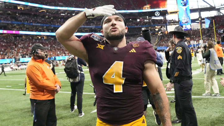 Arizona State running back Cam Skattebo (4) blows a kiss toward fans after Texas won 39-31 in double overtime in the Chick-fil-A Peach Bowl in Atlanta on Jan. 1, 2025.