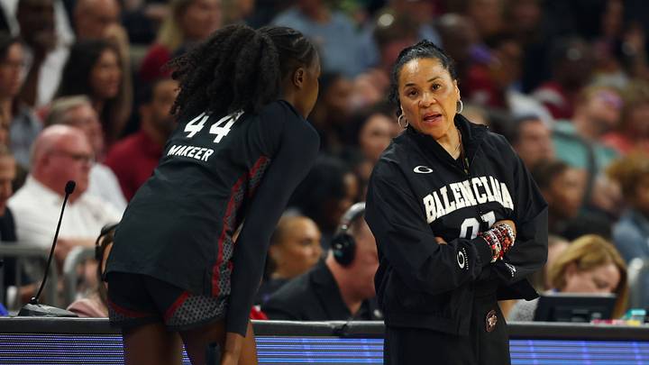 Apr 5, 2026; Phoenix, AZ, USA; South Carolina Gamecocks head coach Dawn Staley with guard Agot Makeer (44) against the UCLA Bruins during the National Championship game of the women's 2026 NCAA Tournament at Mortgage Matchup Center. Mandatory Credit: Mark J. Rebilas-Imagn Images