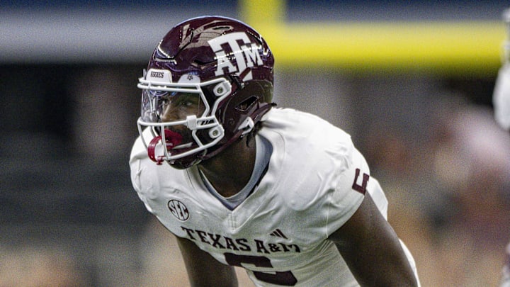 Sep 30, 2023; Arlington, Texas, USA; Texas A&M Aggies defensive lineman Enai White (6) in action during the game between the Texas A&M Aggies and the Arkansas Razorbacks at AT&T Stadium. Mandatory Credit: Jerome Miron-Imagn Images