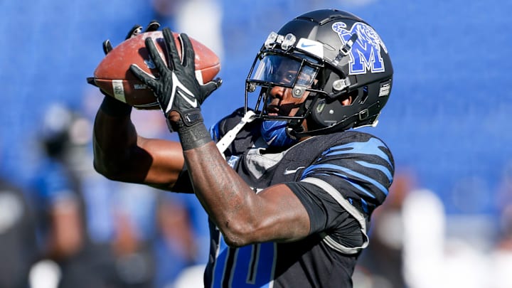 Memphis' An'Darius Coffey (10) warms up before the game between Southern Methodist University and University of Memphis at Simmons Bank Liberty Stadium in Memphis, Tenn., on Saturday, November 18, 2023.