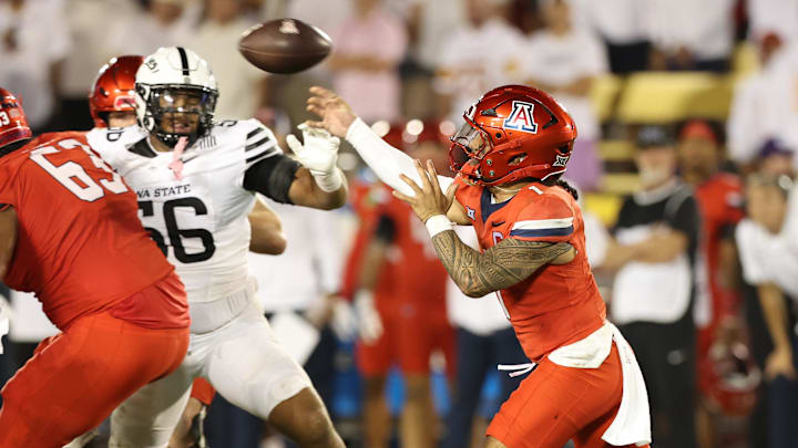 Sep 27, 2025; Ames, Iowa, USA; Arizona Wildcats quarterback Noah Fifita (1) throws a pass against the Iowa State Cyclones during the second half at Jack Trice Stadium. Mandatory Credit: Reese Strickland-Imagn Images Sep 27, 2025; Ames, Iowa, USA; Arizona Wildcats quarterback Noah Fifita (1) throws a pass against the Iowa State Cyclones during the second half at Jack Trice Stadium. Mandatory Credit: Reese Strickland-Imagn Images